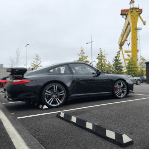 Moulded rubber vehicle stops by Emtek for workplace safety protecting kerbs and vehicles